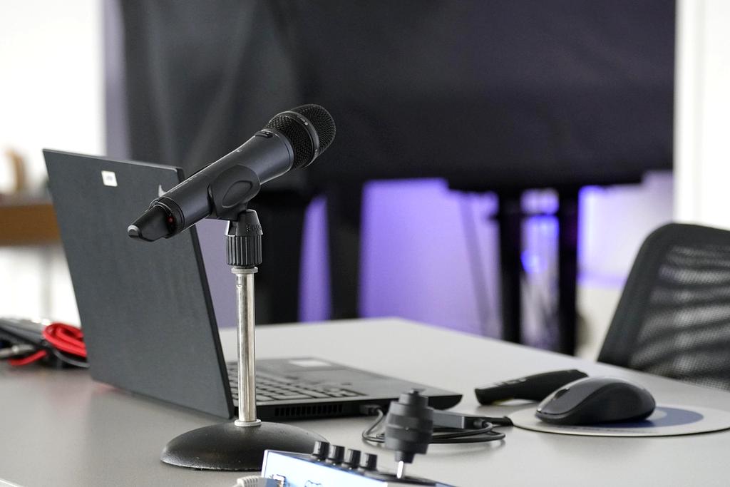 Modern computer technology setup with multiple monitors and advanced hardware